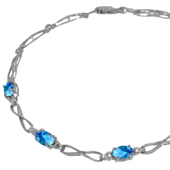 14K GOLD TENNIS BRACELET WITH BLUE TOPAZ & DIAMONS